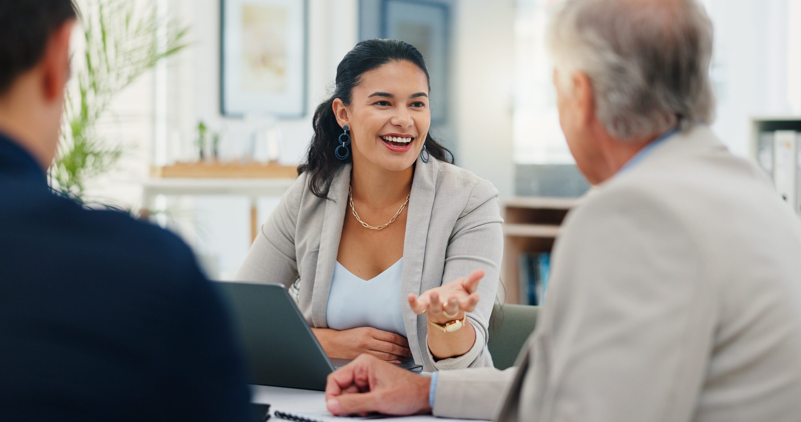 Sales professional having a positive attitude while meeting clients